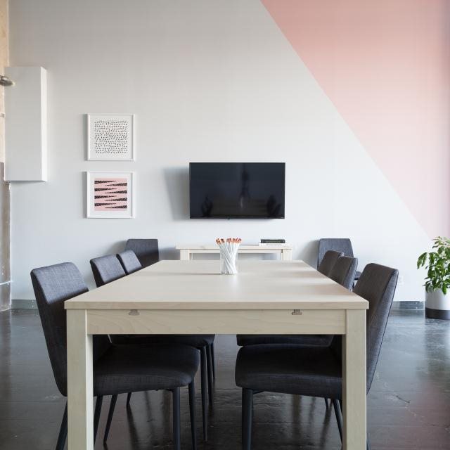 A bright modern meeting room ready for the team