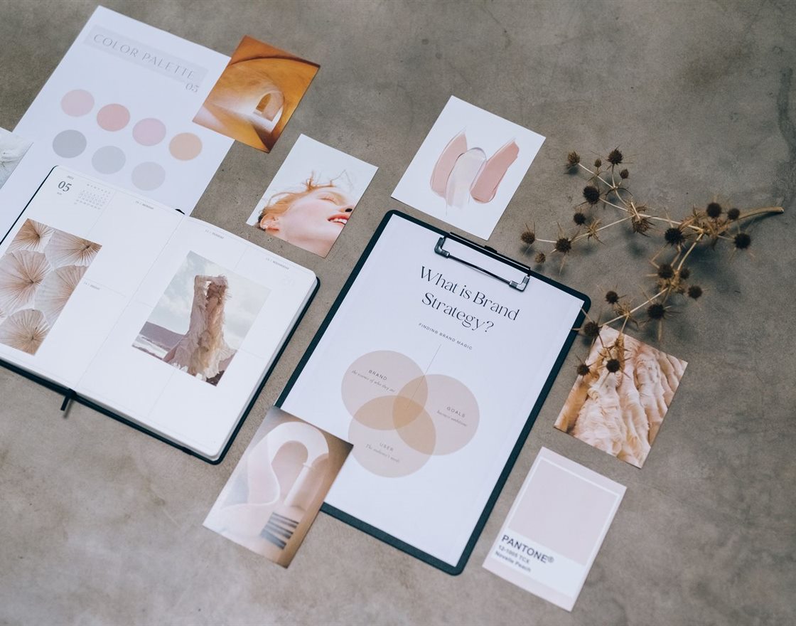 A brand strategy board with mood images and colour swatches