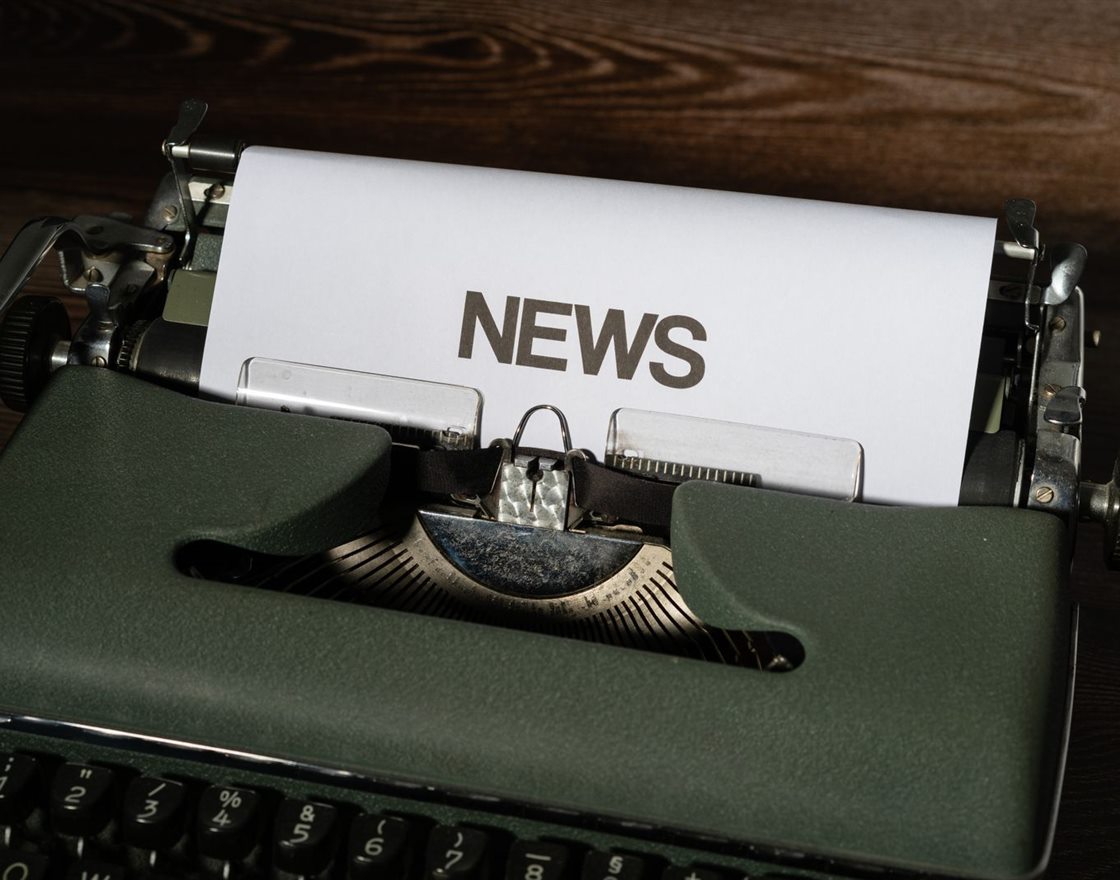 A typewriter with the word News typed on paper
