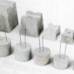 Concrete cover blocks by PM Spacers in different sizes, many with binding wire